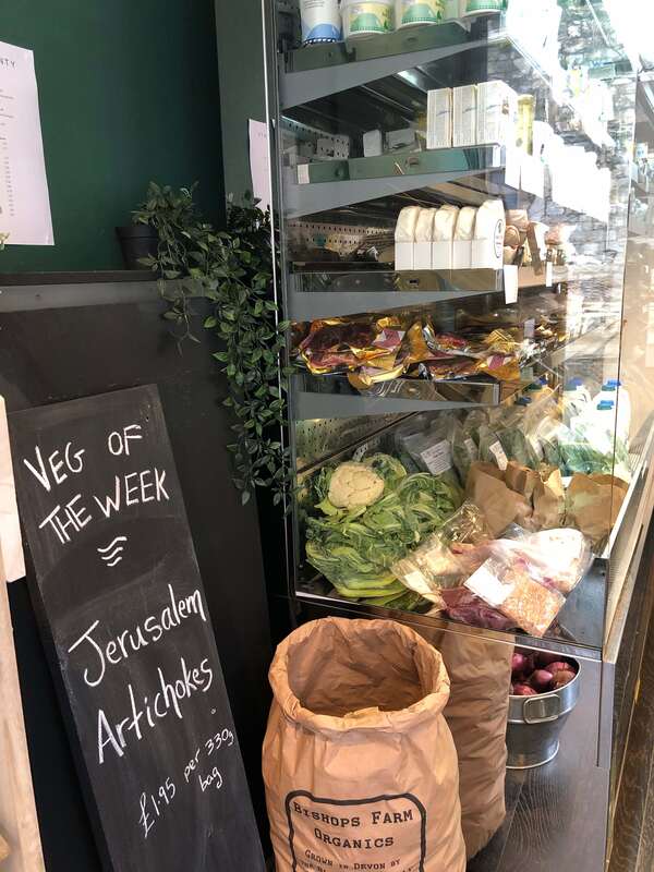 Blackboard and sustainable produce in Crouch End shop Fridge of Plenty.